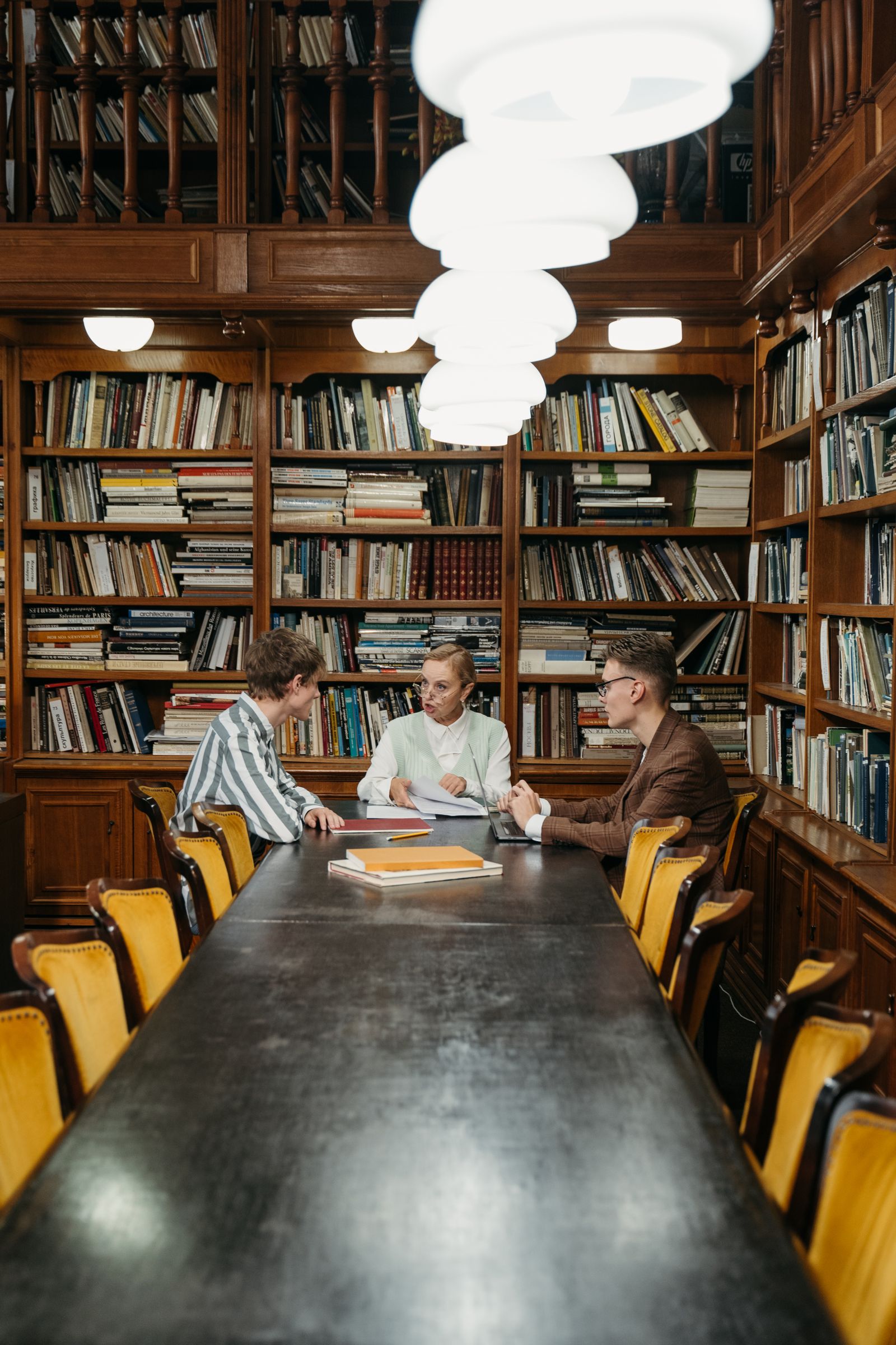 A counsellor and student in a focused discussion about university admissions